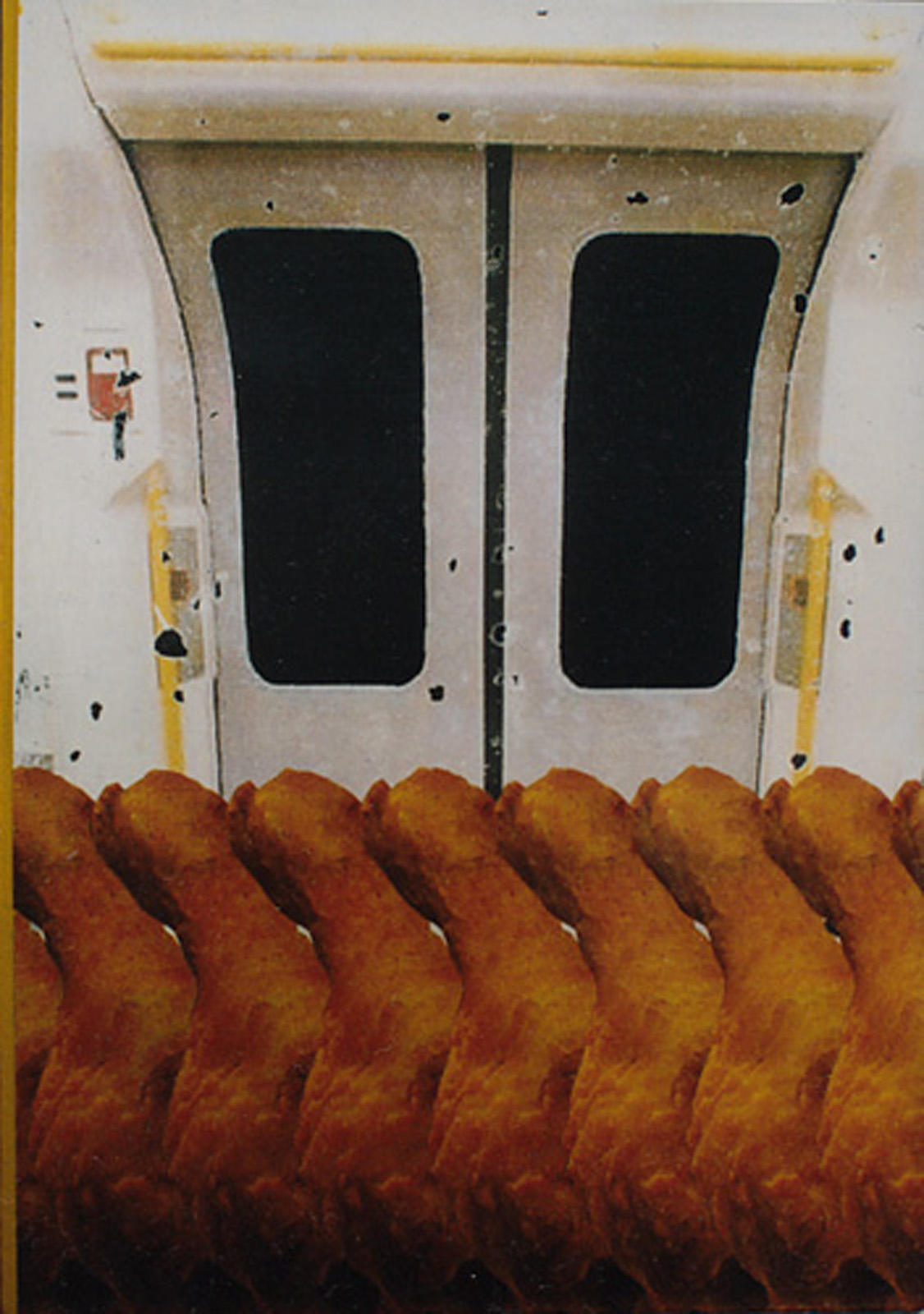 A painting of chicken drumsticks on a tube train
